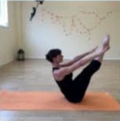 Jayne holding a controlled seated balance position